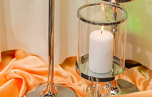 CANDLES AND CANDLESTICKS